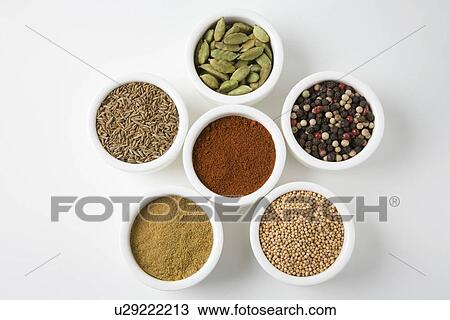Whole cardamoms, peppercorns, mustard seeds, cumin, whole cumin and chilli View Large Photo Image Stock Image - Whole cardamoms, peppercorns, mustard seeds, cumin, whole cumin and chilli. Fotosearch