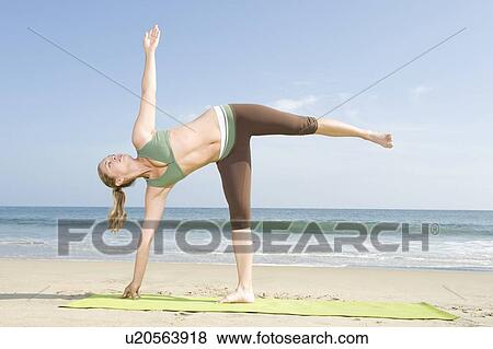 Woman exercising at beach View Large Photo Image Stock Photo - Woman exercising at beach. Fotosearch