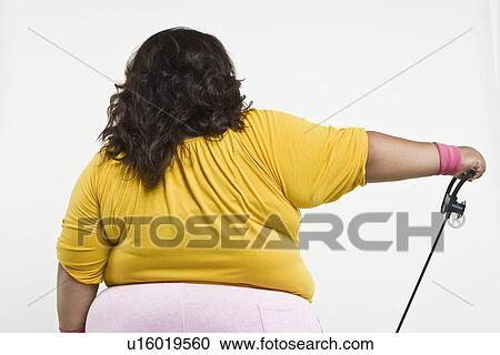 Stock Image - Woman exercising. Fotosearch