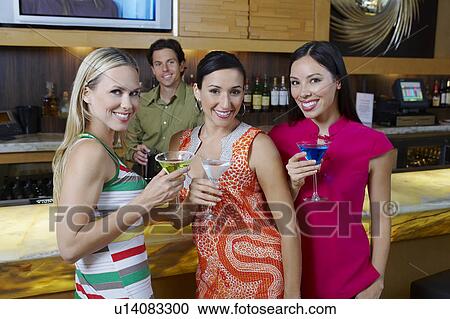 Stock Image - Women at a Bar. Fotosearch