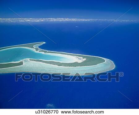 Stock Image - Aerial View of Tupai Island, Tahiti. Fotosearch