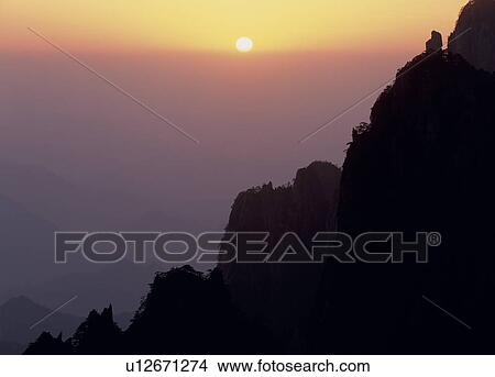 Picture - Evening Sun and Mount Huangshan, Anhui Province, China. Fotosearch