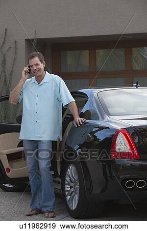 Stock Photo - Owner of luxury vehicle. Fotosearch