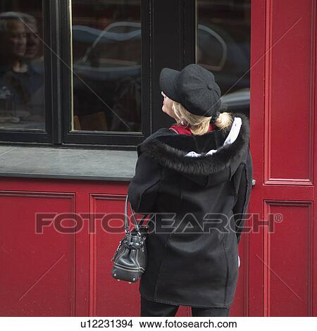 Picture - Back view of a woman in Boston, Massachusetts, USA. Fotosearch