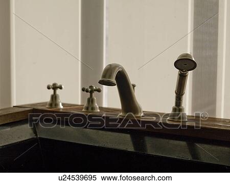 Stock Photography - Bath taps and shower nozzel. Fotosearch