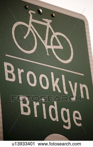 Bicycle lane direction sign to the Brooklyn Bridge in Manhattan, New York City, U. S. A. View Large Photo Image Stock Image - Bicycle lane direction sign to the Brooklyn Bridge in Manhattan, New York City, U. S. A.. Fotosearch