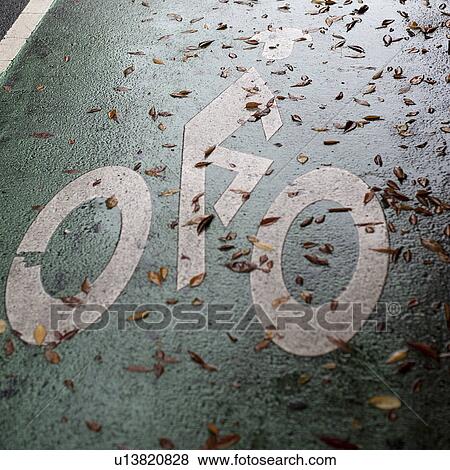 Stock Photo - Biking lane symbol in Manhattan, New York City, U. S. A.. Fotosearch