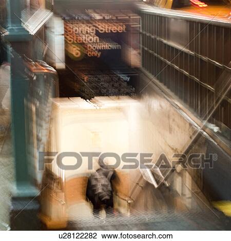 Blurred image of a man coming up the stairsway from the subway in Manhattan, New York City, U. S. A. View Large Photo Image Stock Image - Blurred image of a man coming up the stairsway from the subway in Manhattan, New York City, U. S. A.. Fotosearch