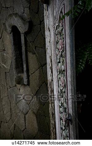 Stock Photography - Carved wall in Bali. Fotosearch
