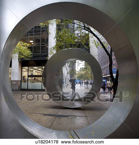 Circular sculpture in Manhattan, New York City, U. S. A. View Large Photo Image Stock Photo - Circular sculpture in Manhattan, New York City, U. S. A.. Fotosearch
