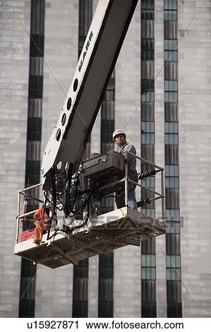 Stock Image - Construction worker in Boston, Massachusetts, USA. Fotosearch
