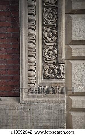 Stock Image - Decorative exterior wall on a bulilding in Boston, Massachusetts, USA. Fotosearch