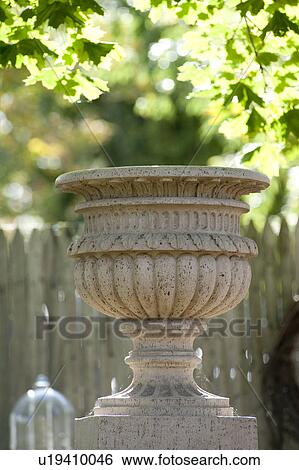 Stock Photograph - Decorative Urn in the Hamptons. Fotosearch