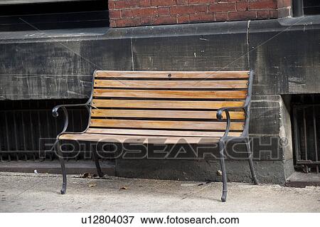 Empty bench on the street in Boston, Massachusetts, USA View Large Photo Image Stock Photo - Empty bench on the street in Boston, Massachusetts, USA. Fotosearch