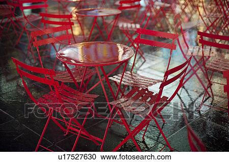 Stock Image - Empty tables and chairs in Times Square Manhattan, New York City, U. S. A.. Fotosearch