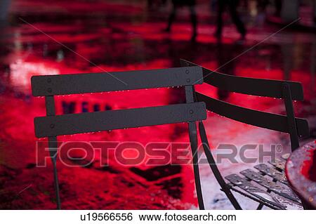Stock Photograph - Empty tables and chairs in Times Square Manhattan, New York City, U. S. A.. Fotosearch