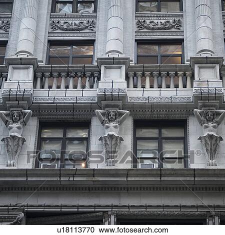 Stock Image - Exterior facade of a building in Manhattan, New York City, U. S. A.. Fotosearch