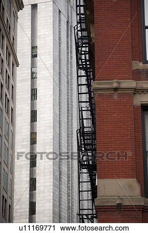 Stock Image - Exterior fire escape on a building in Boston, Massachusetts, USA. Fotosearch