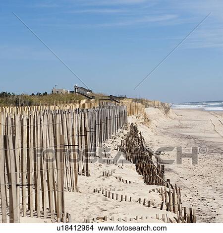 Picture - Fencing along the beach in the Hamptons. Fotosearch
