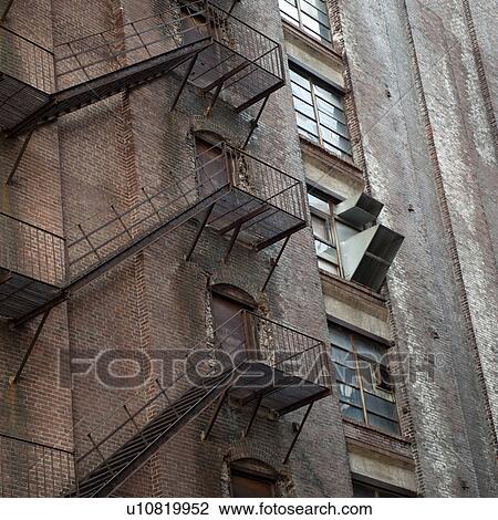 Stock Image - Fire escape on exterior wall in Boston, Massachusetts, USA. Fotosearch
