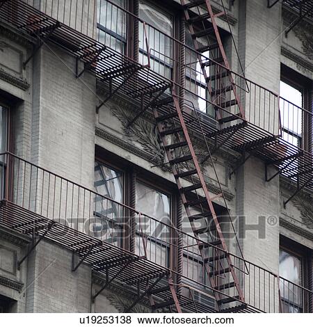 Fire escape on the exterior of a building in Manhattan, New York City, U. S. A. View Large Photo Image Stock Photo - Fire escape on the exterior of a building in Manhattan, New York City, U. S. A.. Fotosearch