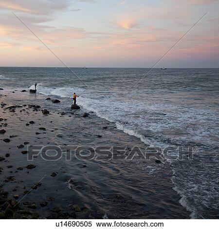 Stock Photography - Fisherman on the Hamptons seashore. Fotosearch