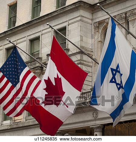 Flags on a building in Manhattan, New York City, U. S. A. View Large Photo Image Stock Photography - Flags on a building in Manhattan, New York City, U. S. A.. Fotosearch