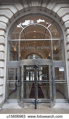 Stock Image - Front entrance to the Flat Iron Building in Manhattan, New York City, U. S. A.. Fotosearch
