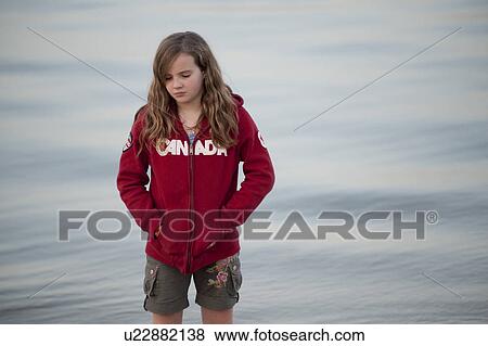 Girl along shoreline in Gimli, Manitoba, Canada View Large Photo Image Stock Photo - Girl along shoreline in Gimli, Manitoba, Canada. Fotosearch