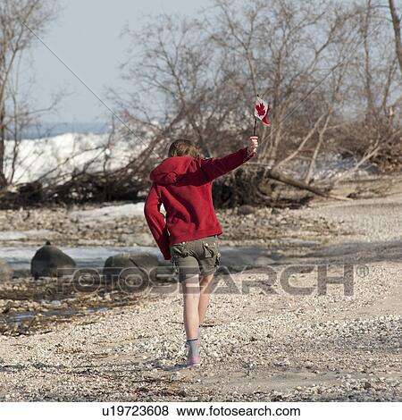 Girl running along Lake Winnipeg shoreline in Gimli, Manitoba Canada View Large Photo Image Stock Photo - Girl running along Lake Winnipeg shoreline in Gimli, Manitoba Canada. Fotosearch