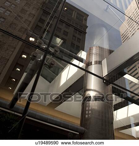 Stock Image - Glass exterior of a building in the Financial District of Boston, Massachusetts, USA. Fotosearch