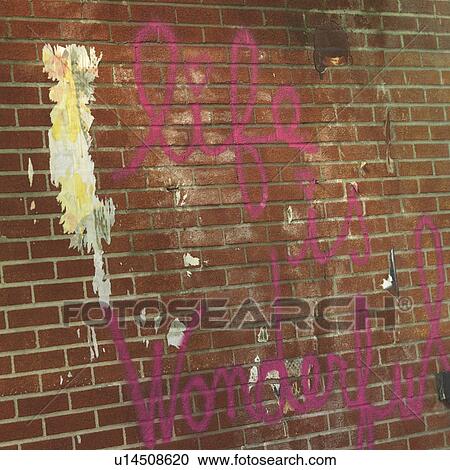 Stock Image - Graffiti on wall of a building in the Meatpacking District of Manhattan, New York City, U. S. A.. Fotosearch