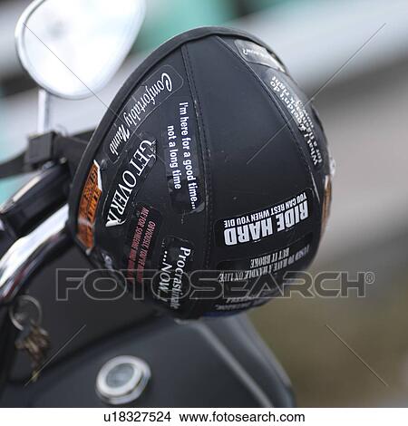 Picture - Helmet on a motorcycle in the Hamptons. Fotosearch
