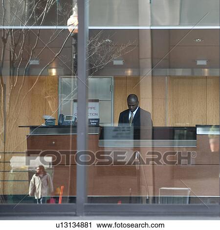 Stock Image - Interior view of a businessman in Boston, Massachusetts, USA. Fotosearch
