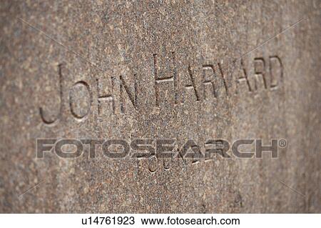 Stock Image - John Harvard memorial at Harvard University in Boston, Massachusetts, USA. Fotosearch