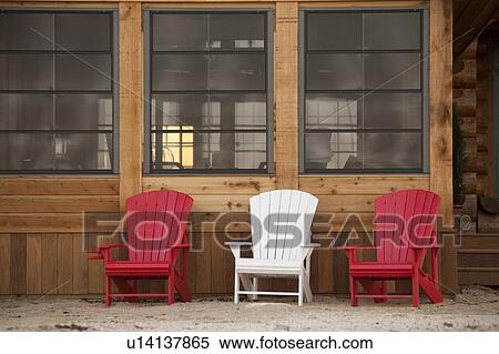 Lounge chairs on a deck in Gimli, Manitoba, Canada View Large Photo Image Stock Photography - Lounge chairs on a deck in Gimli, Manitoba, Canada. Fotosearch