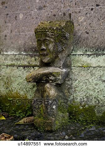 Moss covered figurine in Bali View Large Photo Image Stock Image - Moss covered figurine in Bali. Fotosearch