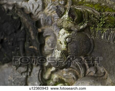 Moss covered sculpture in Bali View Large Photo Image Stock Image - Moss covered sculpture in Bali. Fotosearch