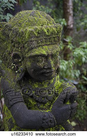 Moss on a statue in Bali View Large Photo Image Stock Image - Moss on a statue in Bali. Fotosearch