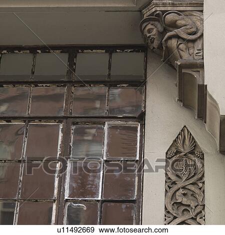 Ornate carvings on a building in the Chelsea area of Manhattan, New York City, U. S. A. View Large Photo Image Stock Photo - Ornate carvings on a building in the Chelsea area of Manhattan, New York City, U. S. A. . Fotosearch