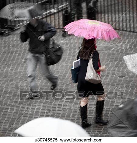Overview of people walking with umbrellas in Manhattan, New York City, U. S. A. View Large Photo Image Stock Photography - Overview of people walking with umbrellas in Manhattan, New York City, U. S. A.. Fotosearch