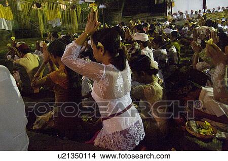 Picture - People praying at a Temple in Bali. Fotosearch