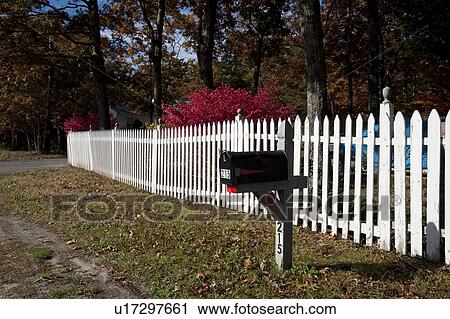 Stock Image - Picket fence in East Hamptons. Fotosearch