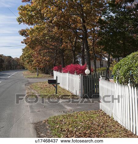Stock Photo - Picket fence in East Hamptons. Fotosearch