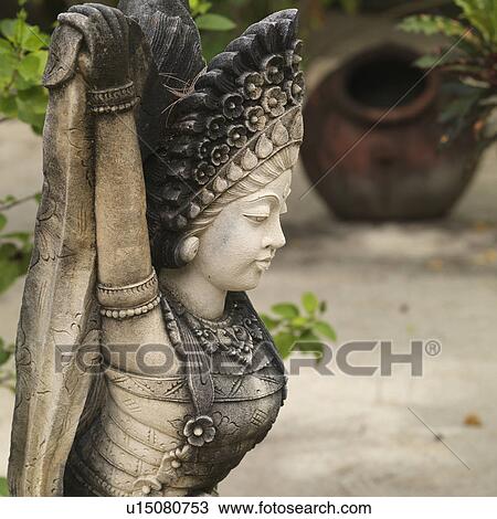 Stock Image - Placencia, Statue. Fotosearch