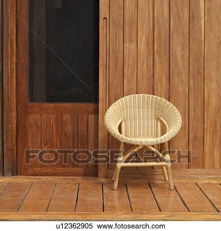 Stock Photography - Placencia, Wicker Chair. Fotosearch