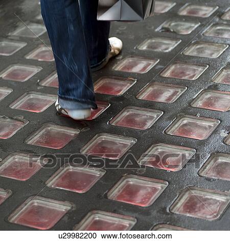 Red glass blocks on a sidewalk in Manhattan, New York City, U. S. A. View Large Photo Image Stock Image - Red glass blocks on a sidewalk in Manhattan, New York City, U. S. A.. Fotosearch