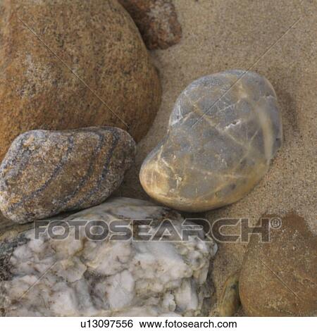Rocks on the beach, The Hamptons, NY View Large Photo Image Stock Photograph - Rocks on the beach, The Hamptons, NY. Fotosearch