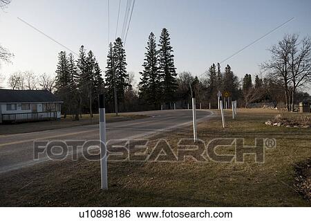 Stock Photograph - Rural road at Winnipeg Beach, Manitoba, Canada. Fotosearch