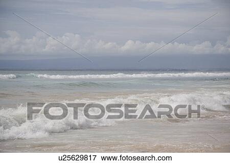 Stock Photo - Seascape along coastline in Bali. Fotosearch